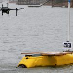 Image of the drone in flight over the jet-powered kayak